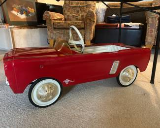 Red Mustang pedal car