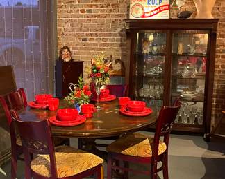 DINING ROOM TABLES GALORE JUST IN TIME TO HOST A FAMILY CHRISTMAS GATHERING, FESTIVE RED DISHES, BEAUTIFUL HANDMADE CHRISTMAS ARRANGEMENTS MADE BY THE TALENTED SANDRA HUVAR.