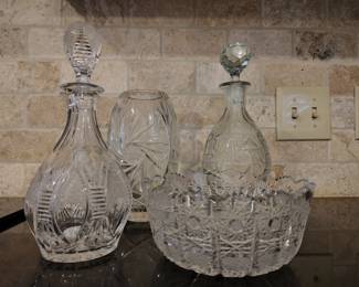 Early cut glass decanters and bowls.