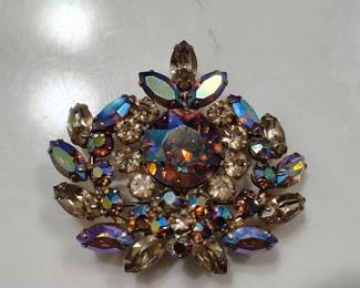 Rare and collectible antique Sherman aurora brooch