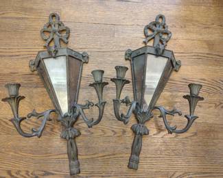 Amazing antique bronze mirrored ram's head sconce set.