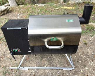 Davy Crockett portable pellet smoker with wheeled storage box included