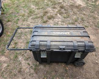 Wheeled storage box included with portable pellet smoker