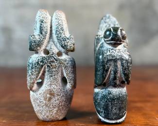 This lot features a pair of Chinese Hongshan Culture hand-carved amulet sculptures, sometimes described as "Sun God Helios" statutes. Each one measures, 5.5” H.
