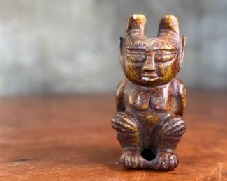 This lot features what appears to be a carved figure, commonly identified as a Hongshan culture jade sculpture. This item measures, 4.5” H x 2.5” W x 2” D.
