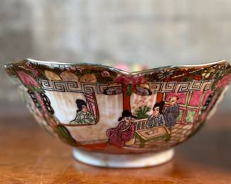 This lot features a pair of antique Chinese porcelain bowls with people scenery painted on the surface. Stamped underneath as shown in photos. The largest bowl measures, 4” H x 10.25” W x 10.25” D.
