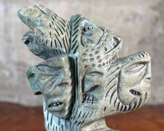 This lot features a stunning Inuit spirit carving in green soapstone by listed Inuit artist, Tytosie Tunnillie. Signed underneath as shown in photos and measures, 13” H x 8.5” W x 4.5” D.
