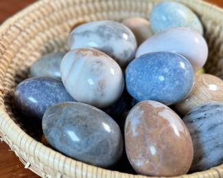 This lot features a collection of fifteen (15) polished stone eggs made from various materials in excellent condition and a fun basket to carry them to your car in!
