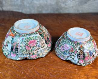This lot features a pair of antique Chinese porcelain bowls with people scenery painted on the surface. Stamped underneath as shown in photos. The largest bowl measures, 4” H x 10.25” W x 10.25” D.
