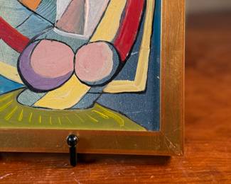 This lot features an original Cubist inspired oil on board, unsigned by artist and measures in frame, 10.75” H x 8.75” W.
