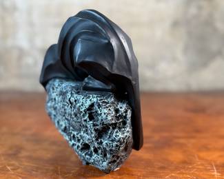 This lot features a black panther sculpture designed by Alexsander Danel for Austin Sculptures, likely produced in the 1990s. Made from a molded resin material, this sculpture measures, 7” H x 8” W x 4” D.
