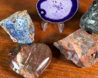 This lot features a collection of stunning rocks & minerals. The raw emerald tower weighs 15.5oz and measures, 3.5” H. The raw azurite rough freeform is from Phoenix and weighs 6.7oz and measures, 3.5” H x 2.5” W. The petrified wood heart weighs 7.6oz and measures, 3” W.

