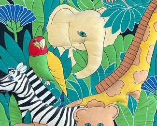 This lot features a safari animal quilt fabric that has been mounted and is ready to hang and display! This piece measures, 34” H x 26” W.
