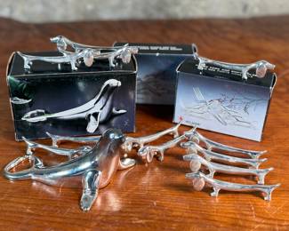 Proceeds from this lot will be donated to non-profit Salem Dogs in Marion County, Oregon. This lot features a set of twelve (12) dachshund fork holders & a silver plated seal bottle opener. All items come in their original packaging. Salem Dogs focus is on helping special needs dogs when their people experience extreme circumstances. Owner death, hospice, and nursing/assisted living situations are some examples that trigger the need for a new home. In addition, some people find themselves unable to afford medical bills and opt to have their dog euthanized. In those cases, Salem Dogs is often contacted and has either taken in the dog or helped the owner financially. While most of their work is in the Salem, Oregon area, this charity has helped dogs in multiple areas around North America.
