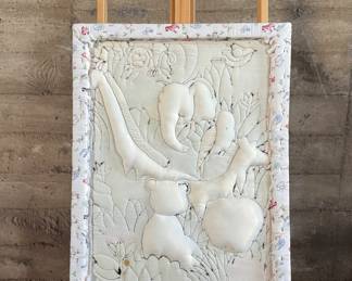 This lot features a safari animal quilt fabric that has been mounted and is ready to hang and display! This piece measures, 34” H x 26” W.
