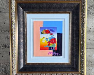 “Umbrella Man”, an over-painted serigraph by listed artist, Peter Max. Signed lower right and professionally framed by Park West Gallery. Measures in frame, 27.75” H x 25.75” W. Peter Max is a German-American artist known for using bright colors in his work. Works by Max are associated with the visual arts and culture of the 1960s, particularly psychedelic art and pop art.
