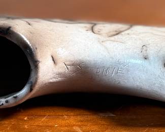 This lot features a pair of beautiful Native American Navajo horse hair pottery buffalo sculptures. Both are signed by artists as shown in photos and each measures, 4” H x 6.5” W x 1.25” D.
