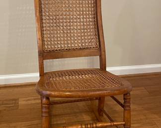 Antique caned rocker 