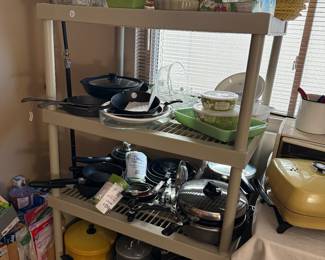 Cookware and food Storage (Pyrex).  Vintage items such as Corning Cornflower and a Beautiful Vintage Anchor Hocking Cassarole dish in Jadeite!  Items from Crate and Barrel!