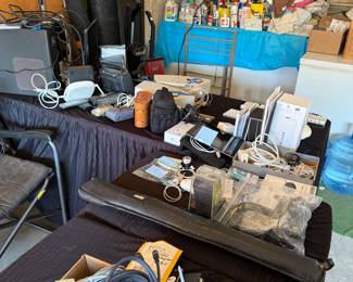 Electronics including Apple and Bose,  Cleaning products and a small chest freezer.  Oreck and Hoover Vacuum cleaners and a Steam mop