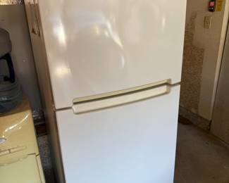 Small Whirlpool Refridgerator, Whirlpool water Dispenser and several 5 gallon full water jugs.