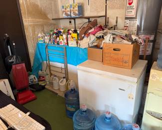 Small Chest Freezer, Whirlpool Water Dispenser, 5 gallon water bottles, Hoover and Oreck Vacuum Cleaners, Steam mop. 
