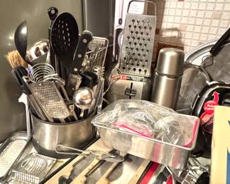 Assorted Kitchen Utensils and Tools in Storage – Knives, Graters & Gadgets