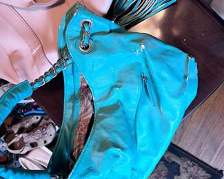 BIG BUDDAH Distressed Turquoise Faux Leather Shoulder Bag with Chain Strap & Oversized Tassel