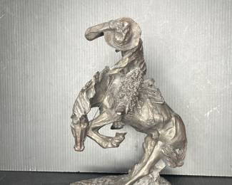 Vintage bronze sculpture titled The Rattlesnake by American artist Frederic Remington