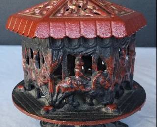 Cast Iron Banks including this carousel