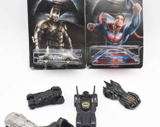 A Collection of Hot Wheels Batman and Superman Die-Cast Cars & Figurine
