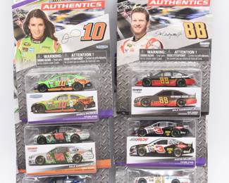 A Set of Six NASCAR Authentics Diecast Race Car Sets
