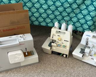 Sewing Machines. Singer is brand new in box.