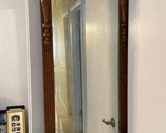 Wood framed wall mirror