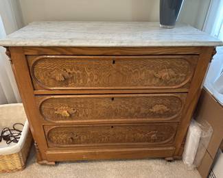 Antique chest of drawers with marble top