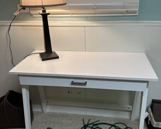 White desk and table lamp