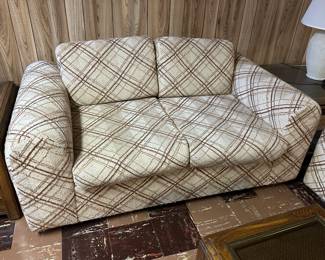 Upholstered loveseat and 