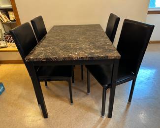 Table and chairs (sold separately).....