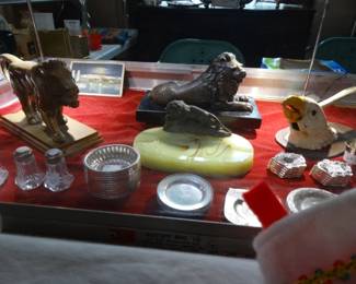 Collectibles Case w/ Small Silver , Onyx Ashtray w/ Lion Figure, Heavy Bronze Standing Lion Nut Cracher and a Metal Eagle Nutcraccker