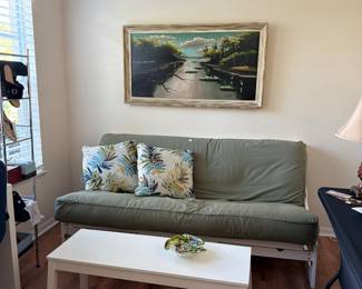 Futon sofa and Highwayman painting