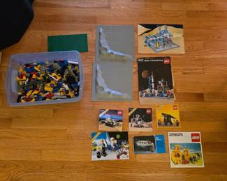 Lego 483 Alpha 1 rocket base and other set instructions. Legos are all mixed up, unsure if any are full sets?