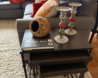 Many side tables including these cute nesting tables