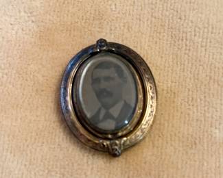 Antique daguerreotype with mourning hair jewelry on reverse