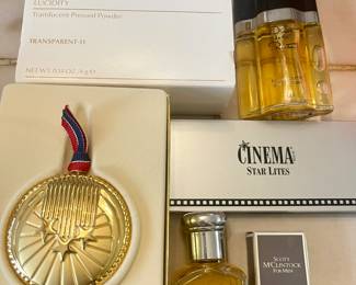 Estée Lauder compact and Oscar de la Renta perfume