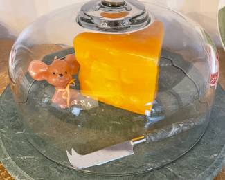 Whimsical marble cloche with cheese and
mouse candles