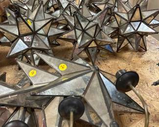 Lots of mirror and glass stars for tealights/candles.