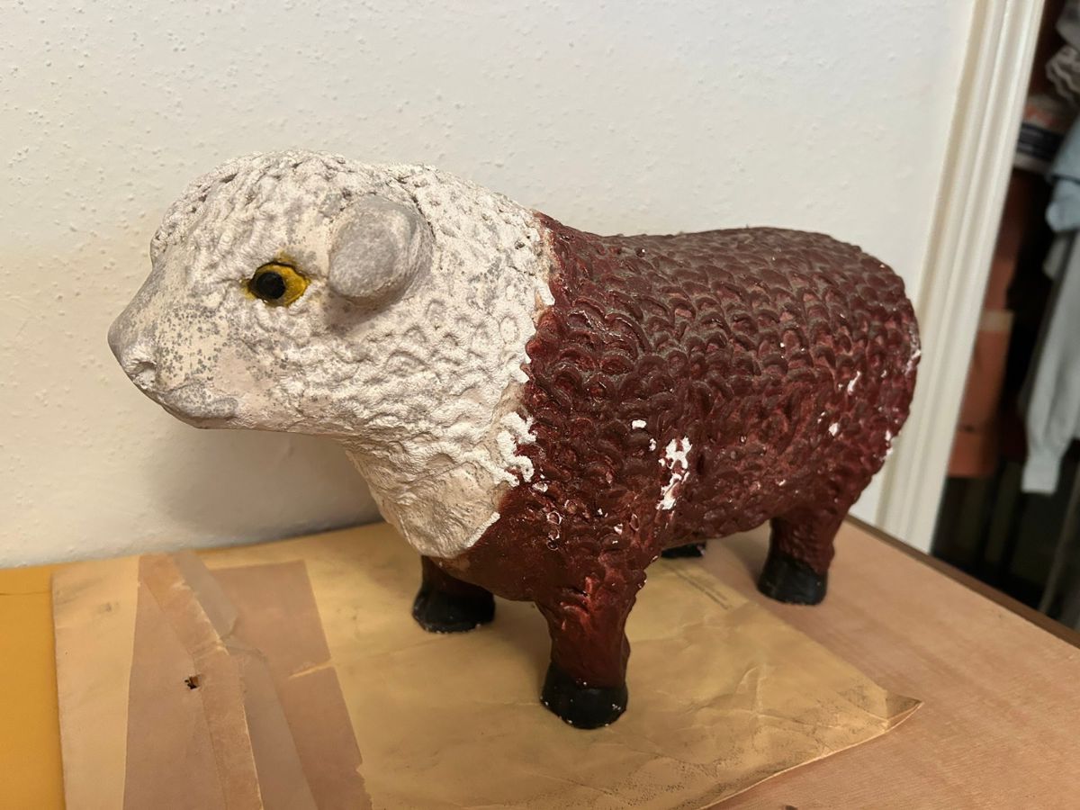 Vintage Chalkware Bull Piggy Bank
No chips or cracks, however there is the obvious paint missing.
15” long x 8” tall 