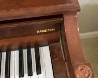 The Baldwin, Hamilton piano with stool. The piano is in excellent condition and has recently been tuned.