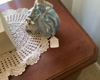 Small mahogany end table by bed. It measures: 20” width, 14” depth, 25 1/2” tall. Vaughn Basset. Price is: $95.00