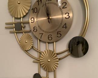 A contemporary wall clock .
